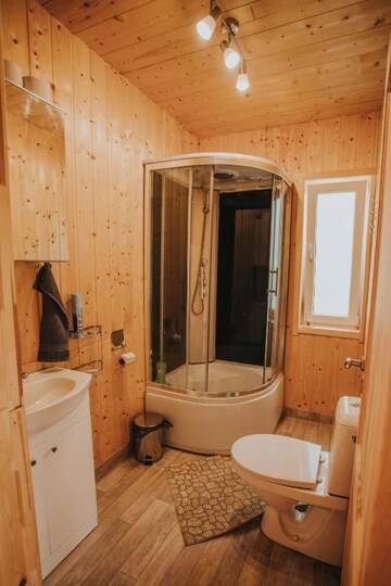 Фото номера Дом с 3 спальнями Дома для отпуска Nītaigā Holiday Home г. Saunags 19