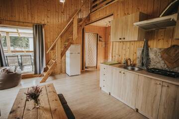 Фото номера Дом с 3 спальнями Дома для отпуска Nītaigā Holiday Home г. Saunags 4
